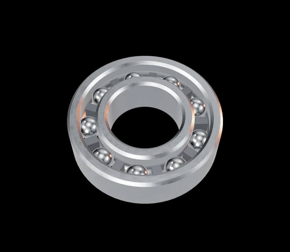 A 6205 deep-groove ball bearing, viewed at an angle: outer ring, nine steel balls held apart by a cage, inner ring, and the bore through the middle